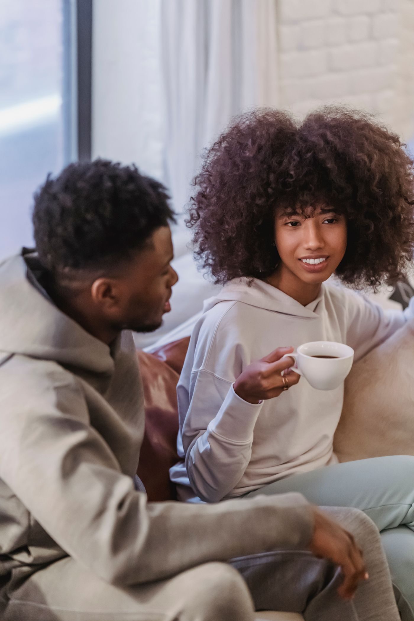 A couple talking together at home